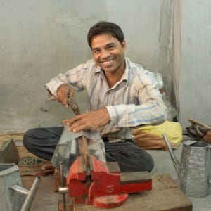 Anwar Saleem, a man in a blue shirt.