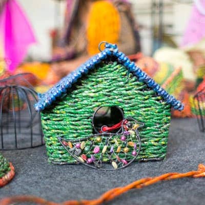A small home made out of woven fibers.