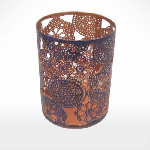 A candle holder available in blue and orange colors offered by a company's product line.